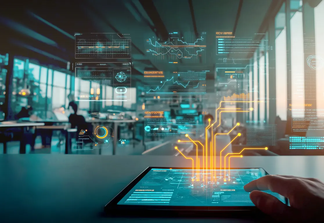 eine Hand, die ein Tablet mit leuchtenden Linien hält